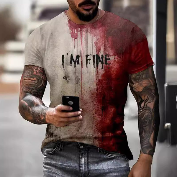 Man wearing a men's short sleeve t-shirt with an all-over 3D print of dripping red blood splatter and the hand-scrawled words I'M FINE across the chest