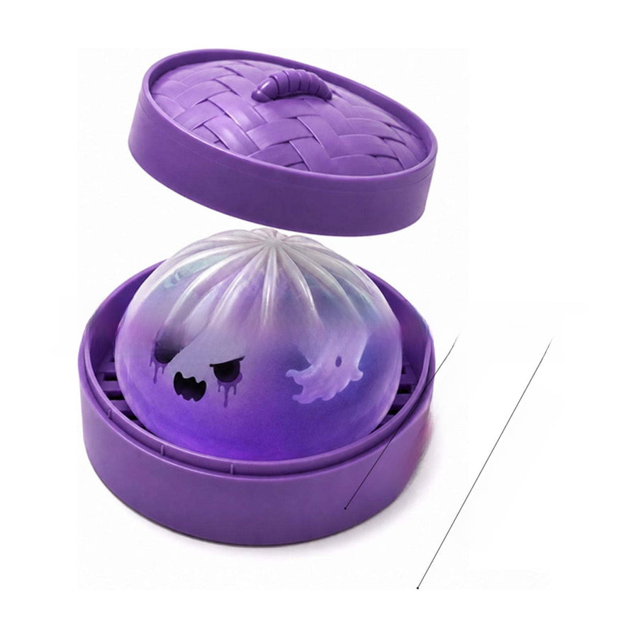 Ghost Dumpling Squishy Halloween toy in its mini steamer basket